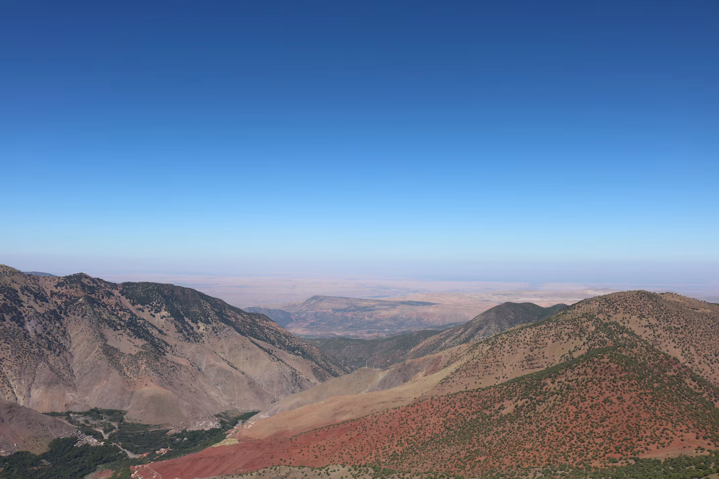 High Atlas Mountains beneath a clear blue sky in Morocco